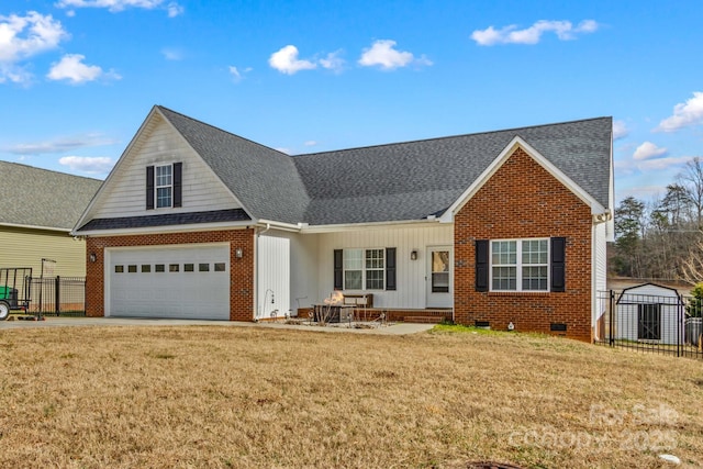 view of front of house featuring a garage and a front lawn