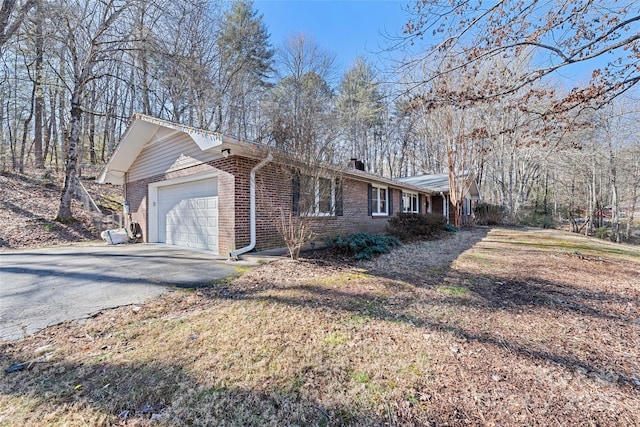 view of side of property with a garage