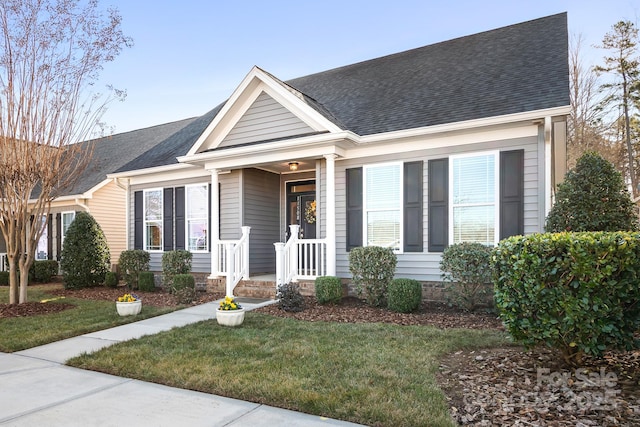 view of front of home with a front yard