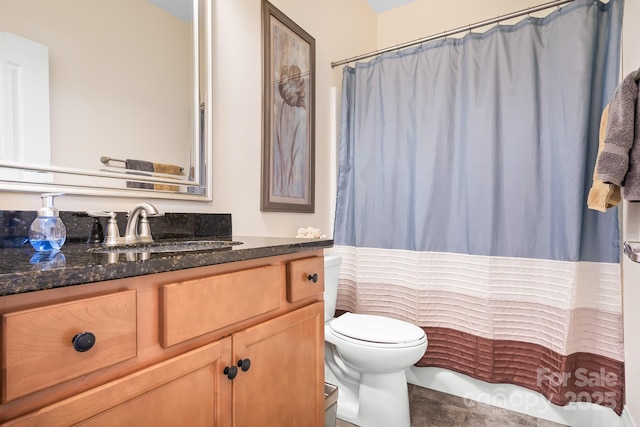 bathroom featuring vanity, toilet, and a shower with shower curtain