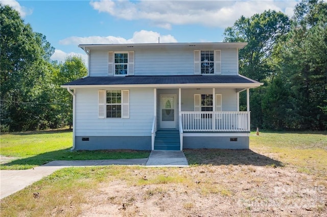 view of front of property featuring a front lawn and a porch