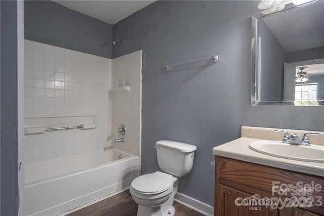 full bathroom featuring shower / tub combination, vanity, toilet, and hardwood / wood-style floors