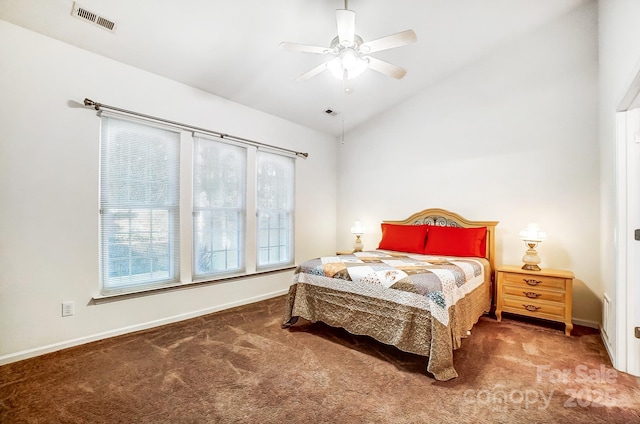 carpeted bedroom with vaulted ceiling and ceiling fan