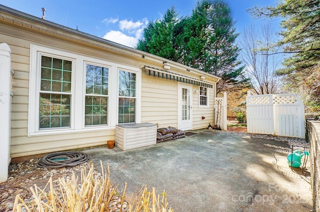 back of house with a patio area