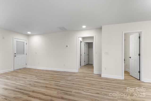 empty room with light wood-type flooring