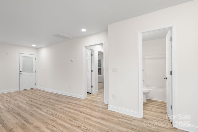 unfurnished room featuring light wood-type flooring