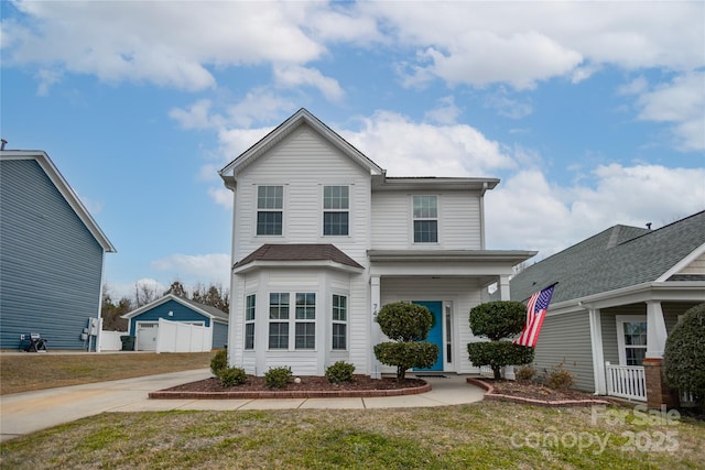 front of property featuring a front lawn