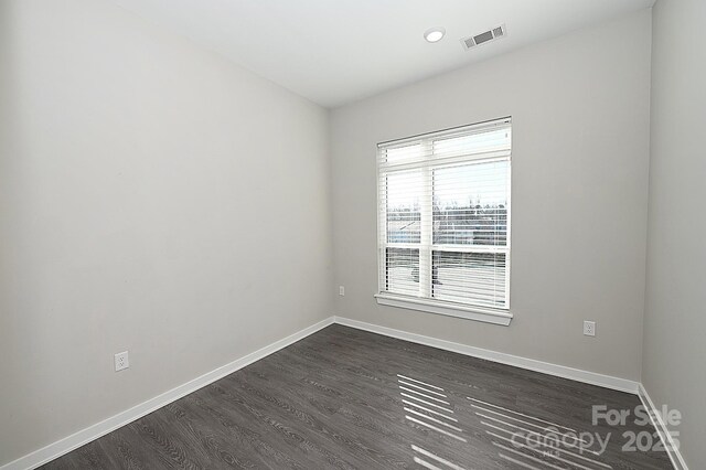 3630 N Davidson St, Charlotte, NC 28205 - empty room featuring dark hardwood / wood-style floors