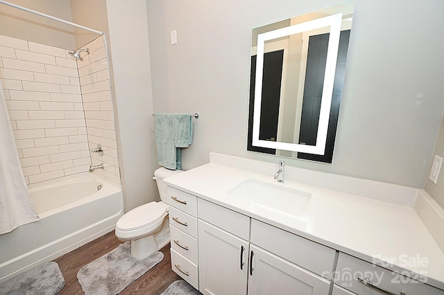 3630 N Davidson St, Charlotte, NC 28205 - full bathroom featuring vanity, tiled shower / bath combo, wood-type flooring, and toilet