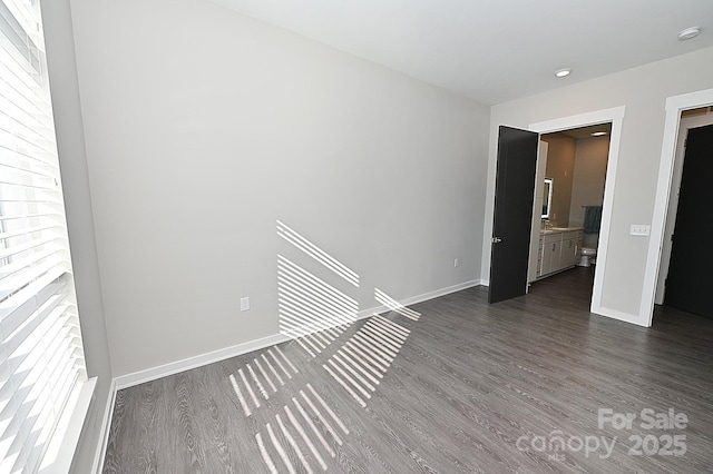 3630 N Davidson St, Charlotte, NC 28205 - spare room with dark hardwood / wood-style flooring