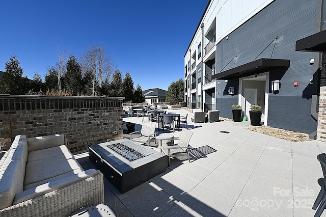 3630 N Davidson St, Charlotte, NC 28205 - view of patio / terrace featuring an outdoor living space with a fire pit