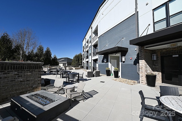 3630 N Davidson St, Charlotte, NC 28205 - view of patio featuring an outdoor fire pit