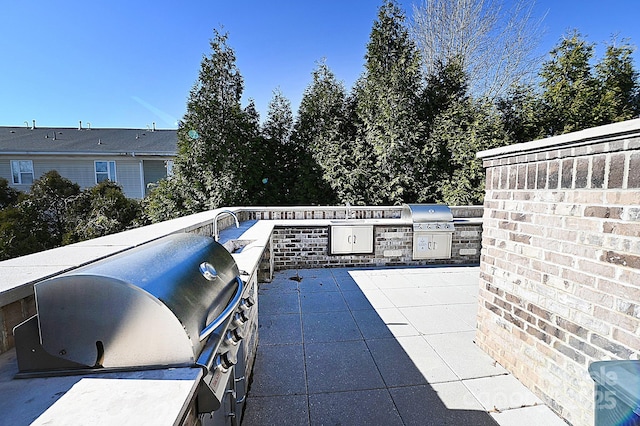 3630 N Davidson St, Charlotte, NC 28205 - view of patio with an outdoor kitchen, a grill, and sink
