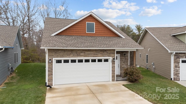 view of front of property with a garage, stone siding, roof with shingles, and a front lawn