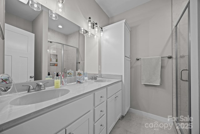 bathroom with vanity and walk in shower