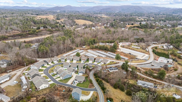 drone / aerial view featuring a mountain view