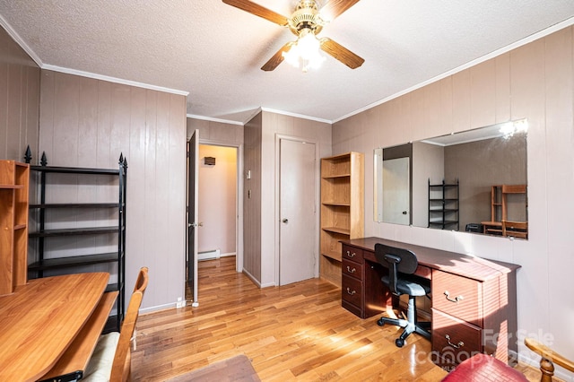 office with crown molding, light hardwood / wood-style flooring, ceiling fan, a baseboard heating unit, and a textured ceiling