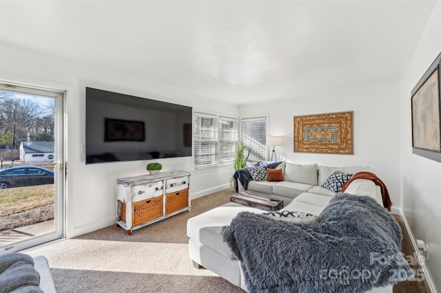 living room featuring light colored carpet