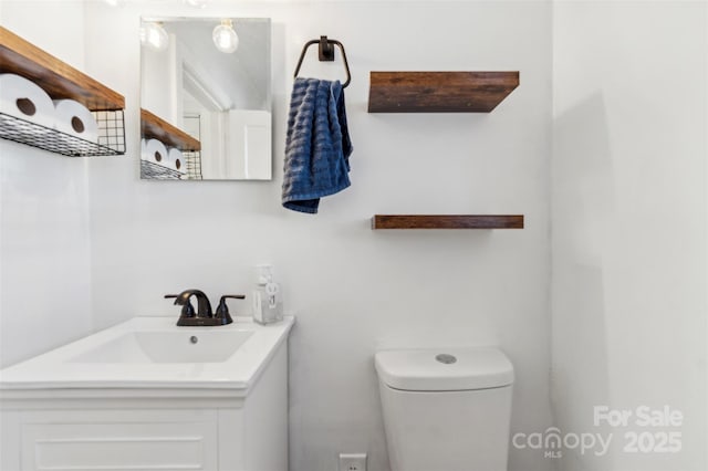 bathroom with sink and toilet