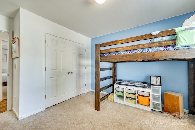 bedroom featuring carpet floors and a closet