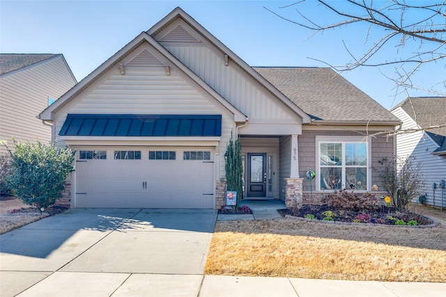 craftsman-style home with a garage