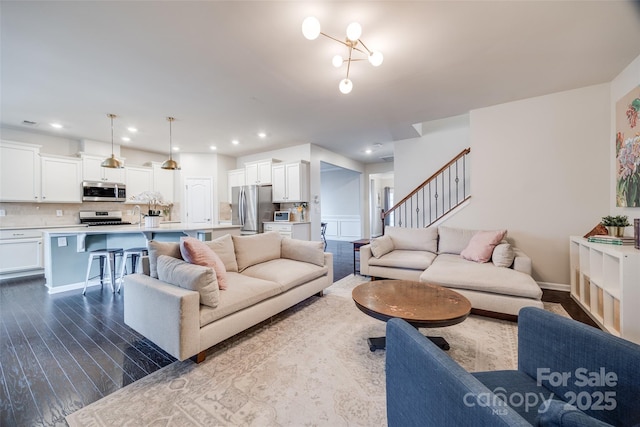 living room featuring dark hardwood / wood-style flooring