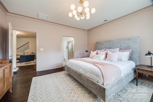 bedroom with crown molding, dark hardwood / wood-style floors, and a chandelier