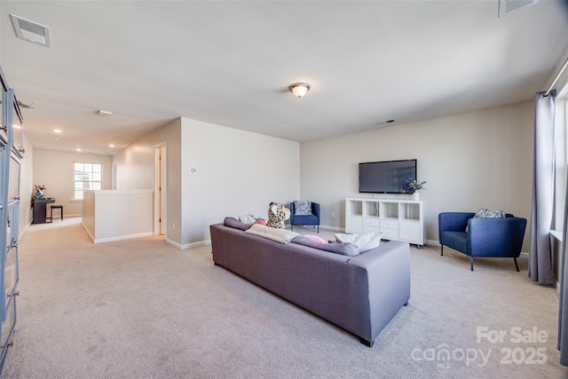 living room featuring light carpet