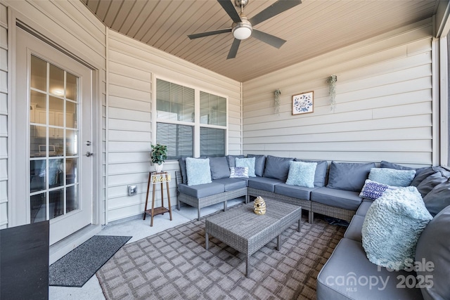 view of patio featuring an outdoor hangout area and ceiling fan