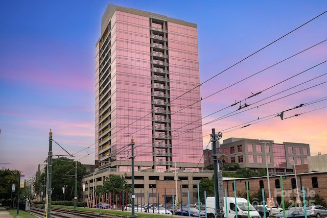 view of outdoor building at dusk