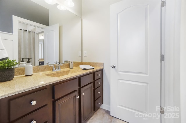 bathroom featuring vanity and tile patterned floors