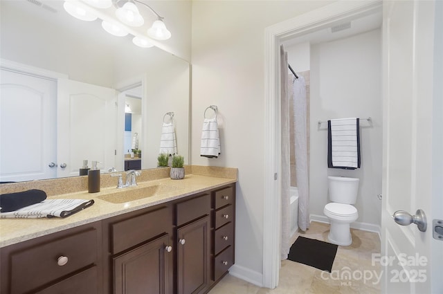 full bathroom featuring tile patterned floors, toilet, a chandelier, vanity, and shower / bath combo with shower curtain