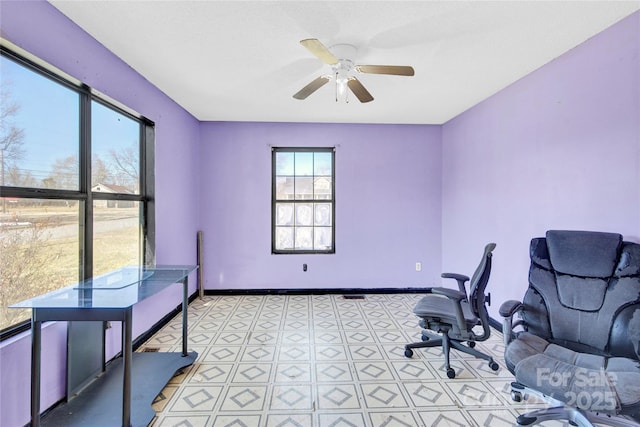 office area with ceiling fan