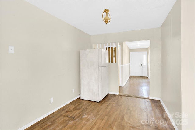 unfurnished room featuring hardwood / wood-style floors