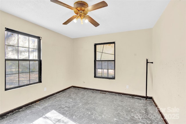 unfurnished room featuring ceiling fan