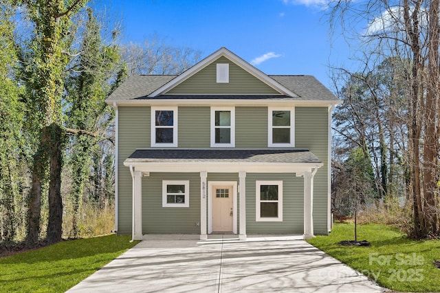 front facade with a front lawn