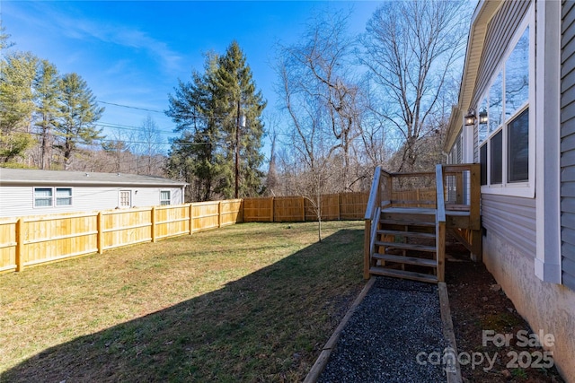 view of yard featuring a wooden deck
