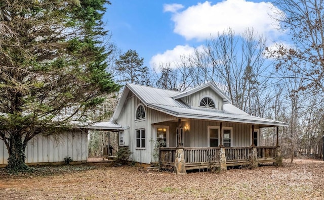 view of front of home featuring central AC unit and covered porch