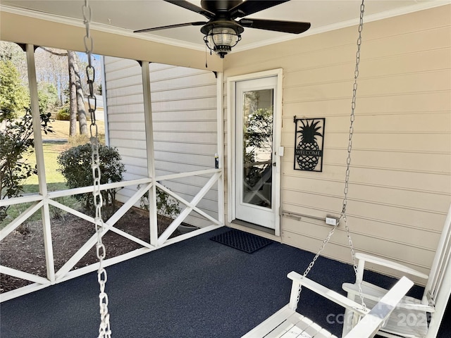 property entrance featuring ceiling fan