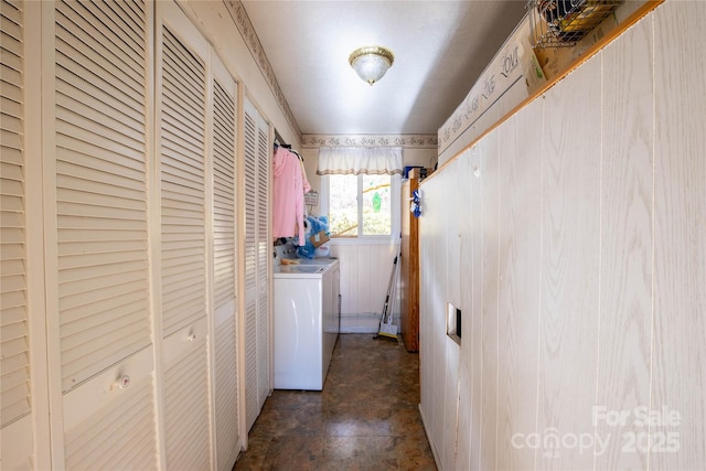 laundry area with independent washer and dryer