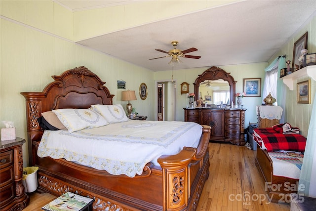 bedroom featuring ceiling fan and light wood-type flooring