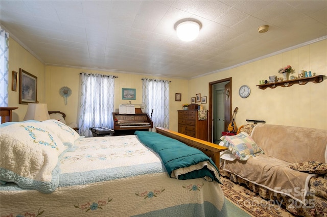 bedroom featuring crown molding