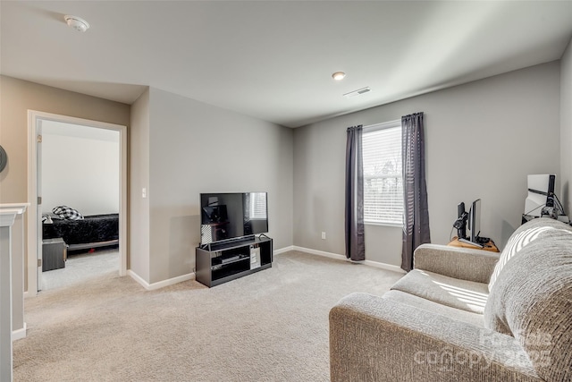 living room featuring light colored carpet