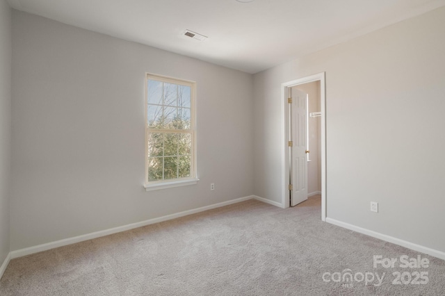 view of carpeted spare room