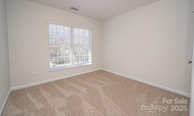 view of carpeted spare room