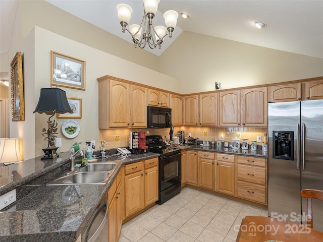 kitchen featuring sink, black appliances, hanging light fixtures, light tile patterned floors, and backsplash