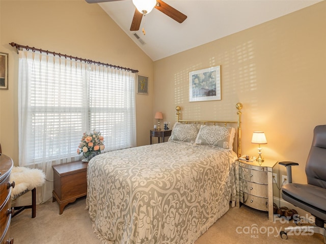 carpeted bedroom featuring ceiling fan and lofted ceiling