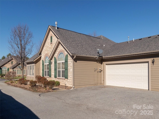 view of home's exterior featuring a garage