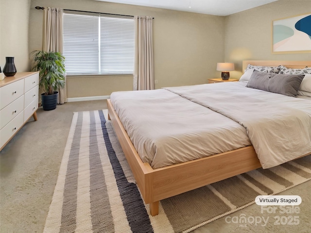 bedroom with light carpet