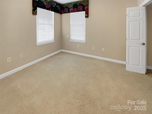 spare room with carpet flooring